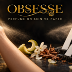 Gold OBSESSE logo above a wrist, perfume blotter strips, bergamot, jasmine and cedar comparing scent on skin and paper